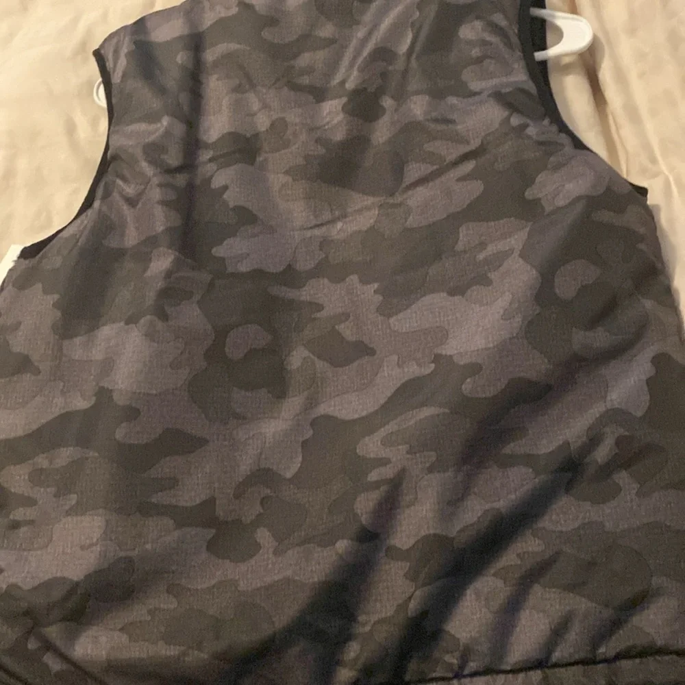 Buffalo reversible vest size 14/16 camo one side and blue with faux fur top opp